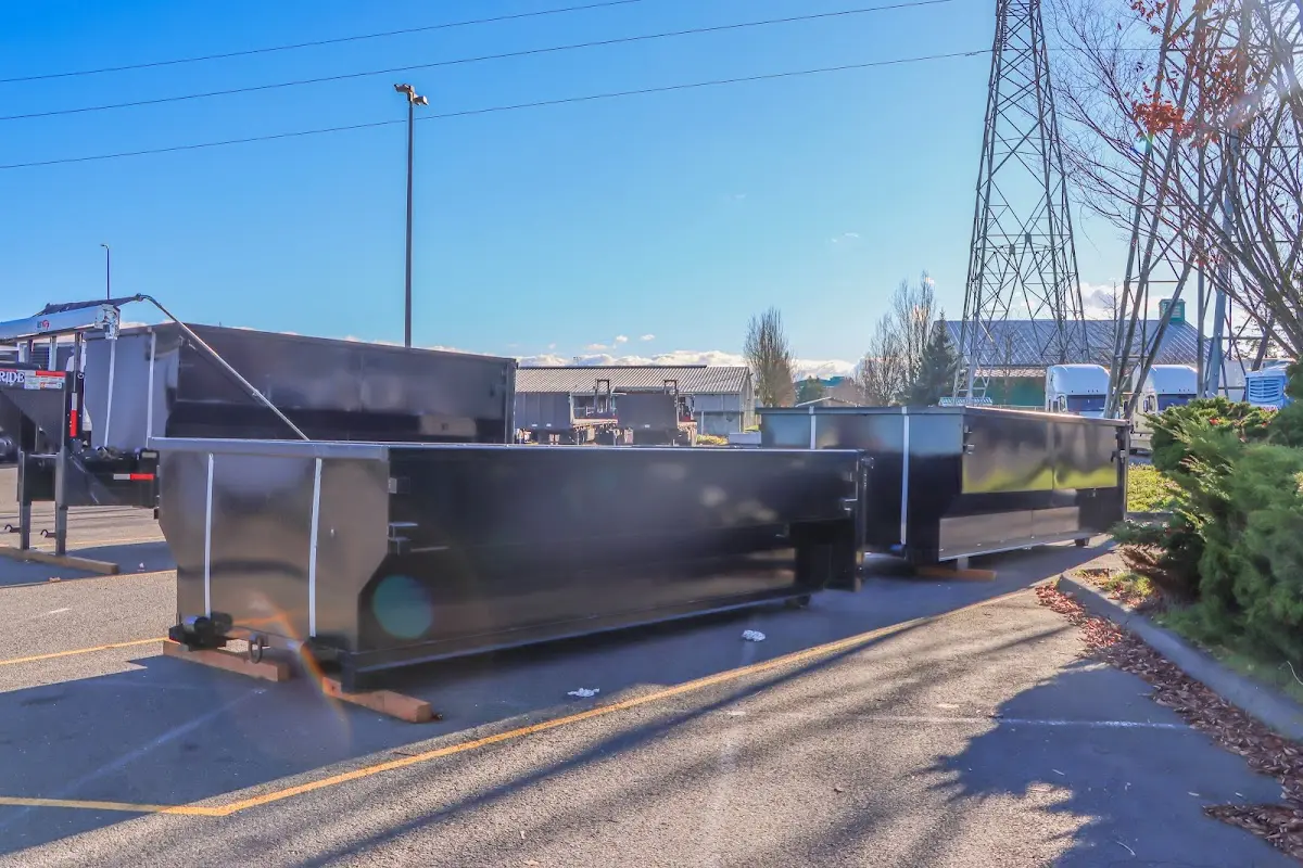 Roll-off dumpster ready for waste disposal at job site for Construction Dumpster Rental in Gulfport